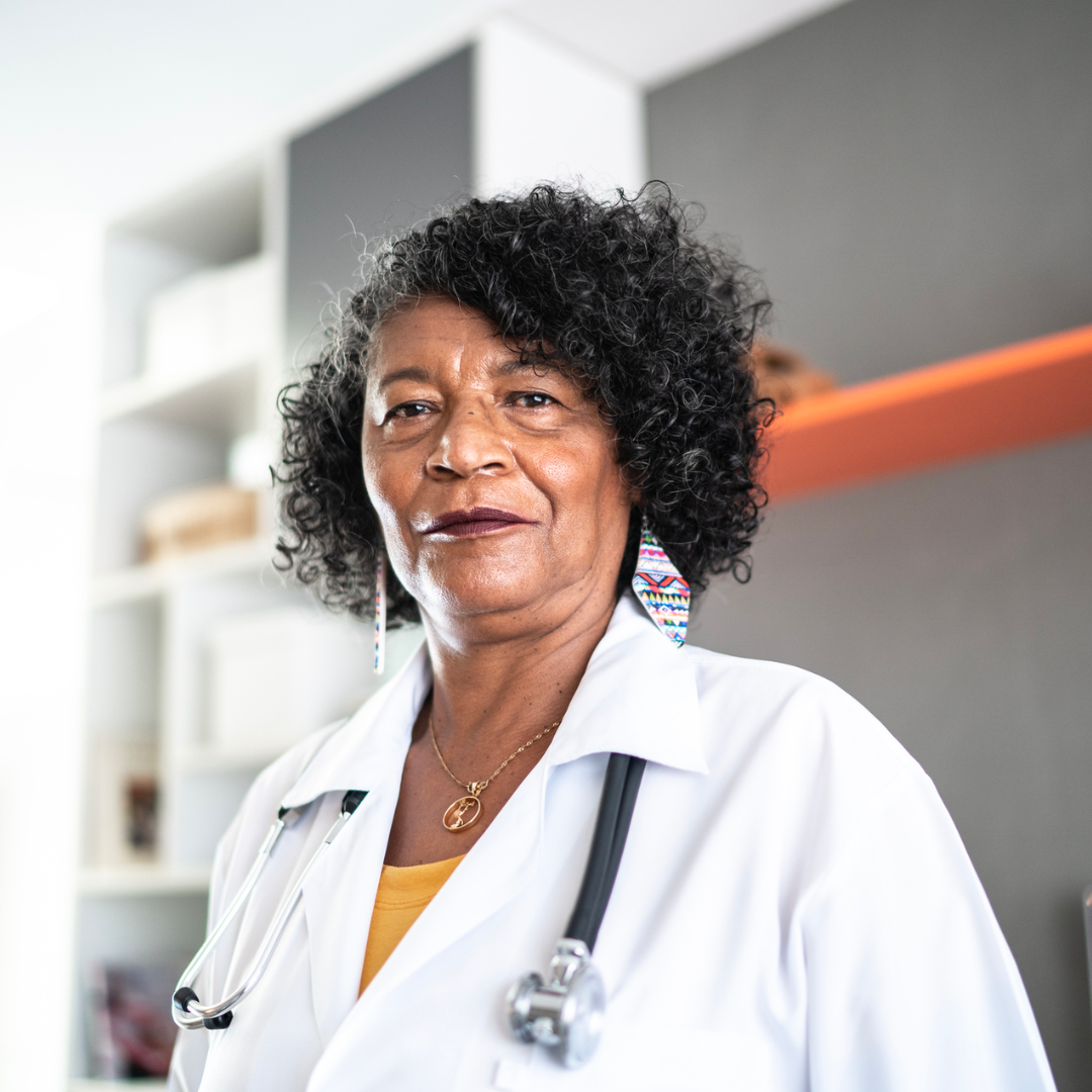 female African American doctor standing in her office