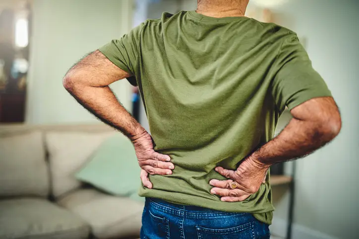 Cropped shot of a senior man suffering from back pain