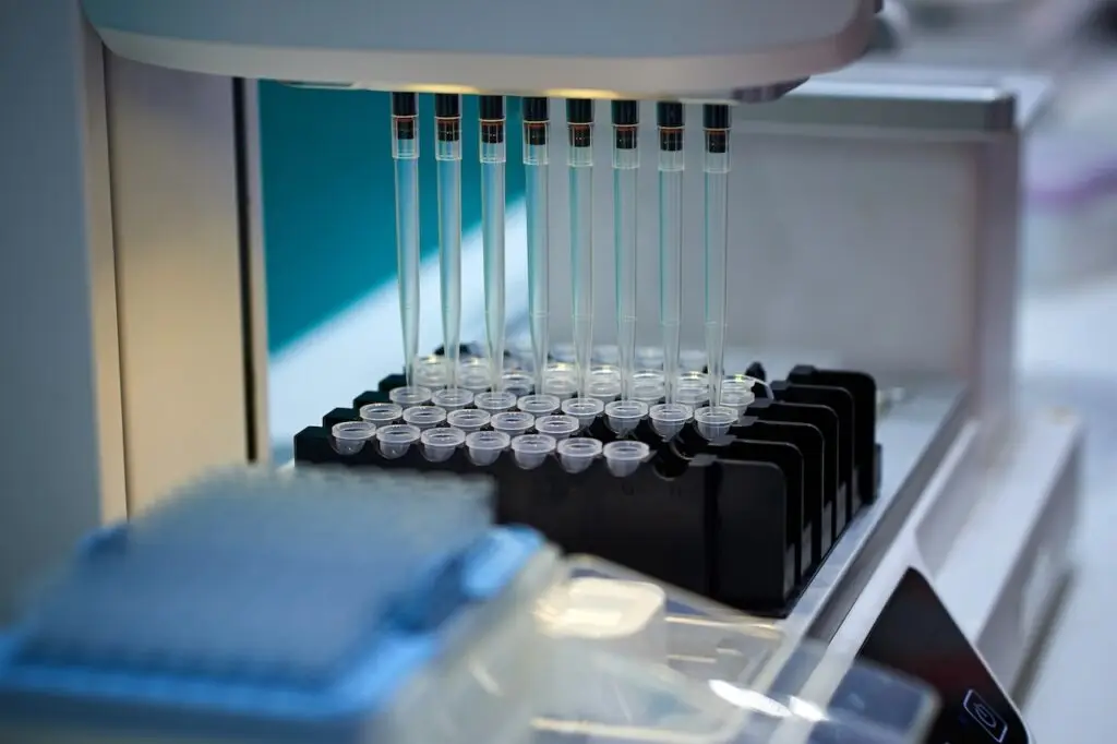 Close-up of analyzing samples at laboratory