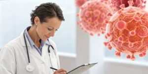 Doctor with a patient chart explaining why secondary breast cancer is considered incurable.