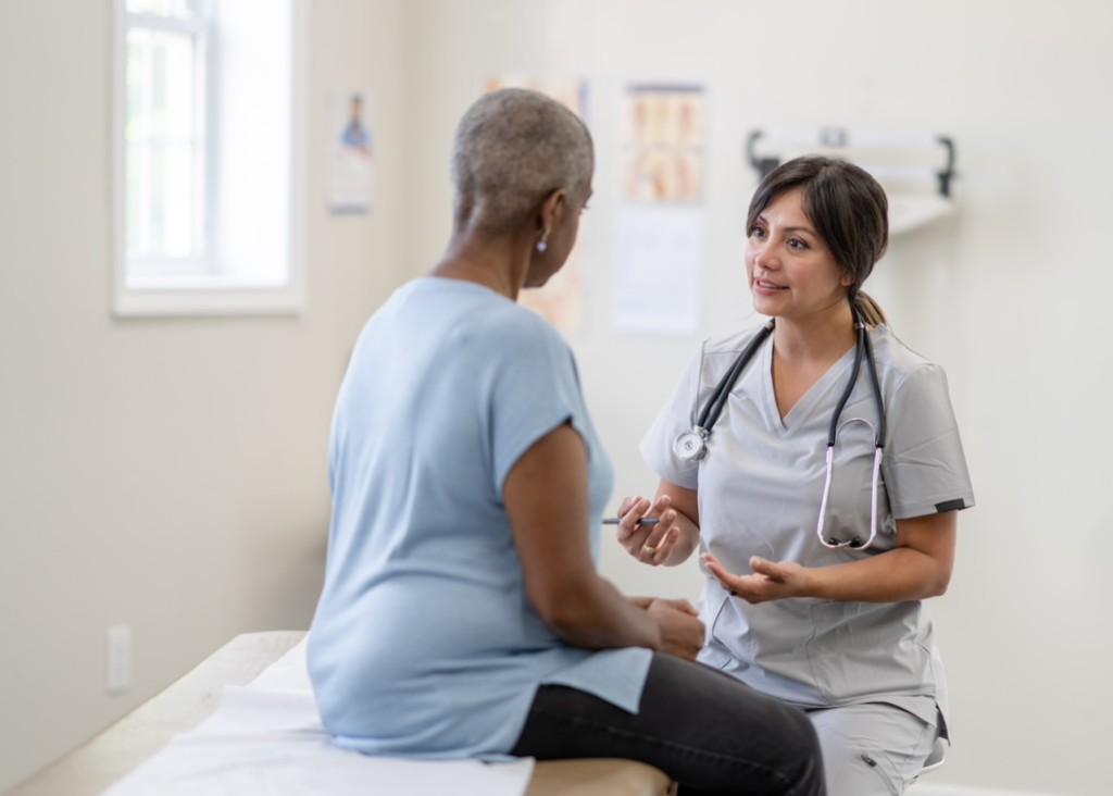 patient talking to healthcare professional in a clinic