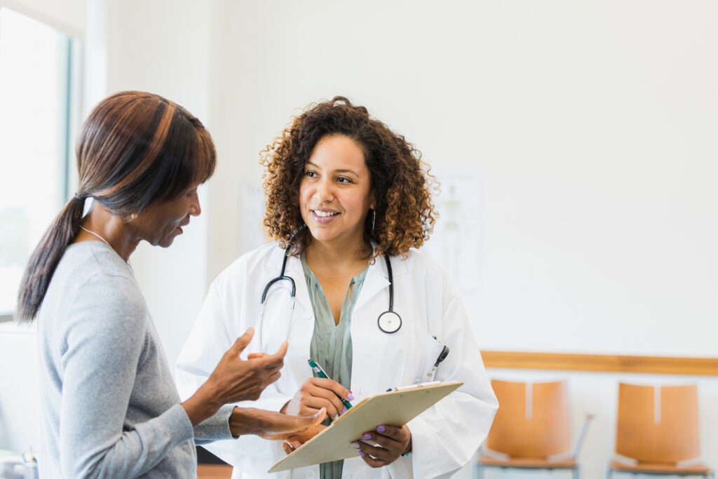 Doctor consults patient in an office