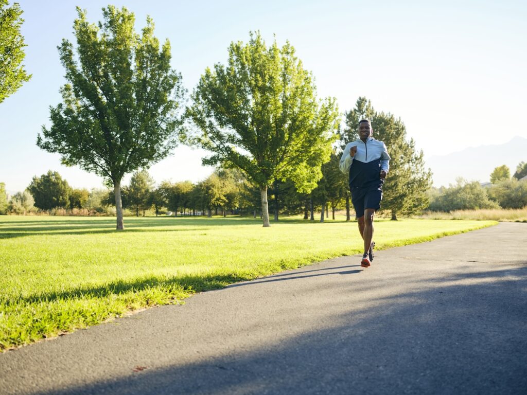Mature Man Exercising in a Park in the Morning