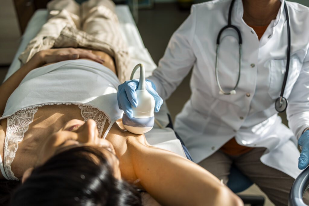 Woman receiving a breast ultrasound