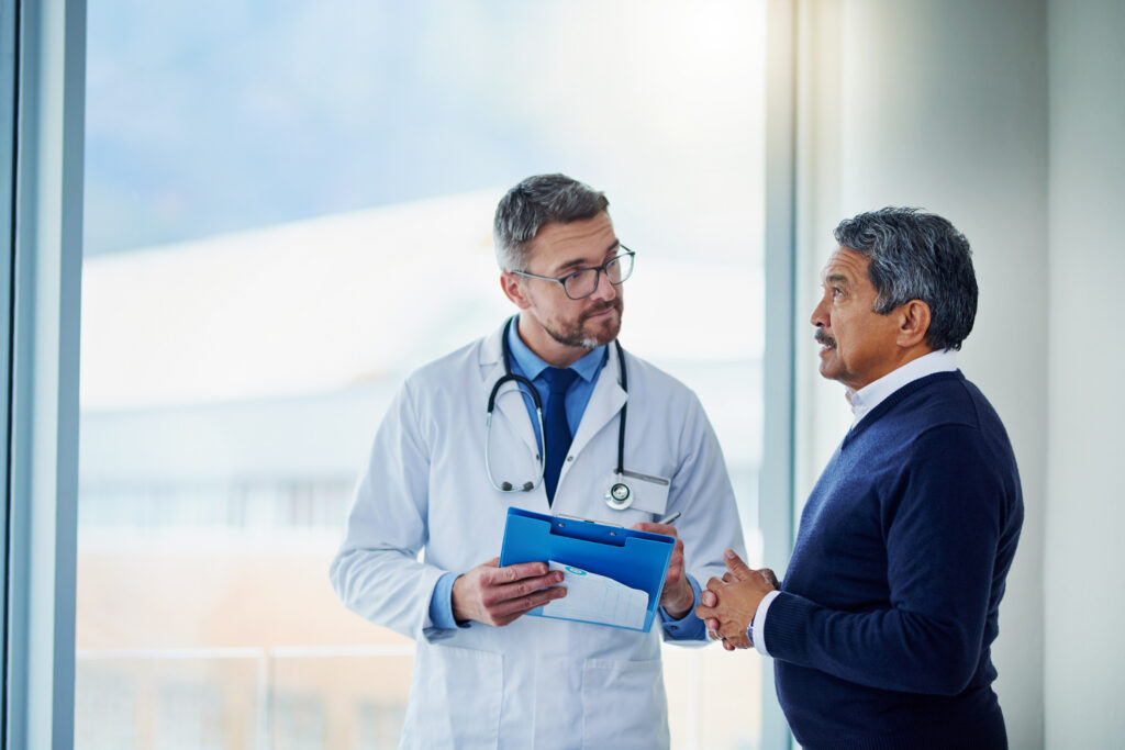 doctor having a consultation with a patient in his office
