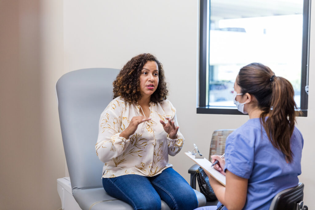 Female patient talks to the doctor